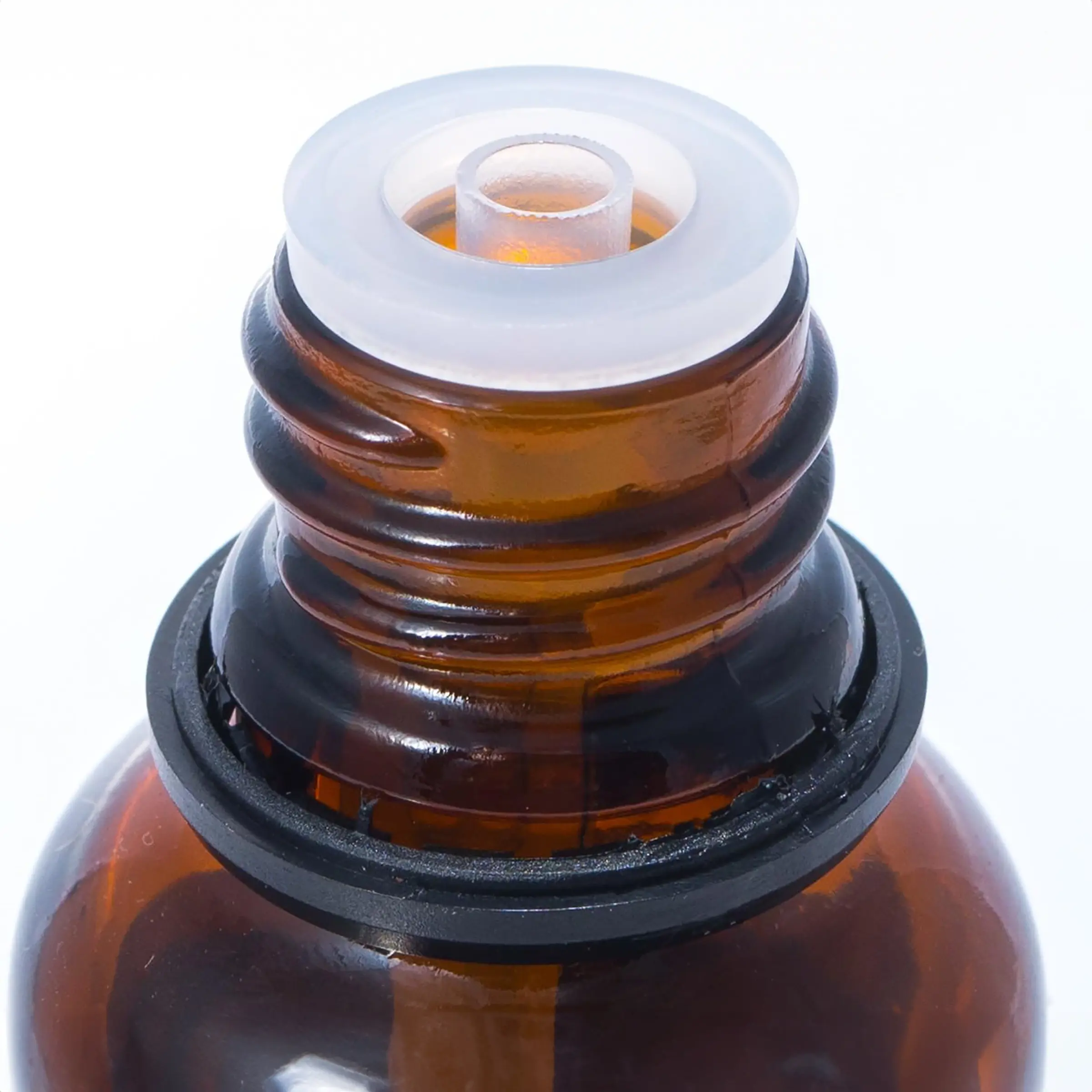 Close-up of essential oils amber bottle.