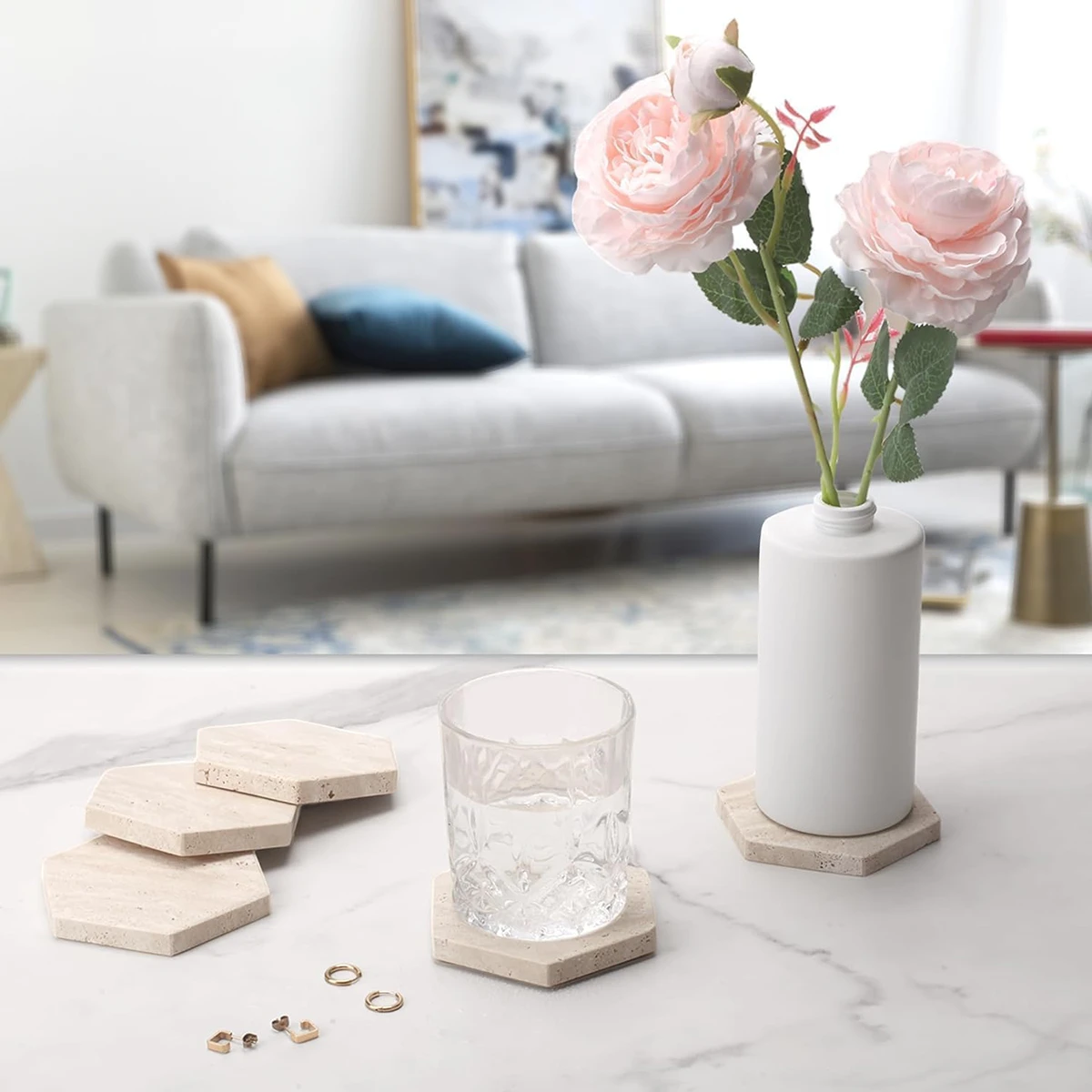 Hexagon marble coaster set displayed in a stylish living room, blending protection with modern design aesthetics.